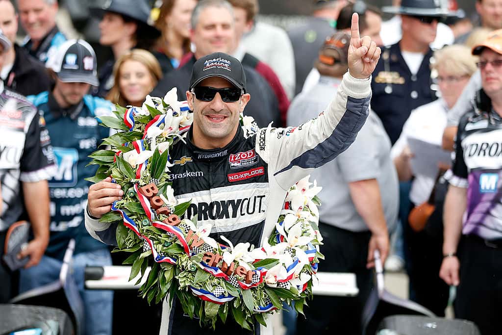Tony Kanaan of Brazil, driver of the Hydroxycut KV Racing Technology-SH Racing Chevrolet, celebrates in victory circle during the IZOD IndyCar Series 97th running of the Indianpolis 500 mile race at the Indianapolis Motor Speedway on May 26, 2013 in Indianapolis, Indiana.
