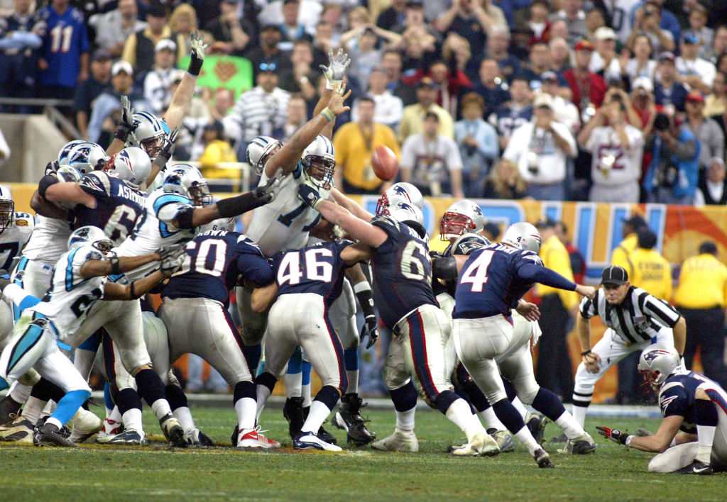 (2/1/04 Houston, TX) Superbowl XXXVIII: New England Patriots vs. Carolina Panthers at the Reliant Dome in Houston. Patriot Adam Vinatieri kicks the game-winning field goal making the final score 32-29. (E99A1754.JPG - Staff Photo by Matthew West. S