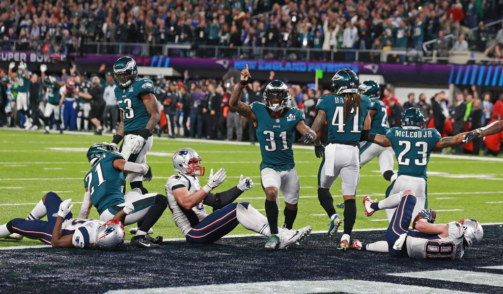 (02/04/2018- Minneapolis, MN) Philadelphia Eagles inside linebacker Chris Long pressures New England Patriots quarterback Tom Brady to throw an incompletion on the Pats final drive of Super Bowl LII at US Bank Stadium on Sunday, February 4, 2018. Sta